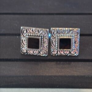 Napier screw back earrings Silver toned with black center. Pre- owned